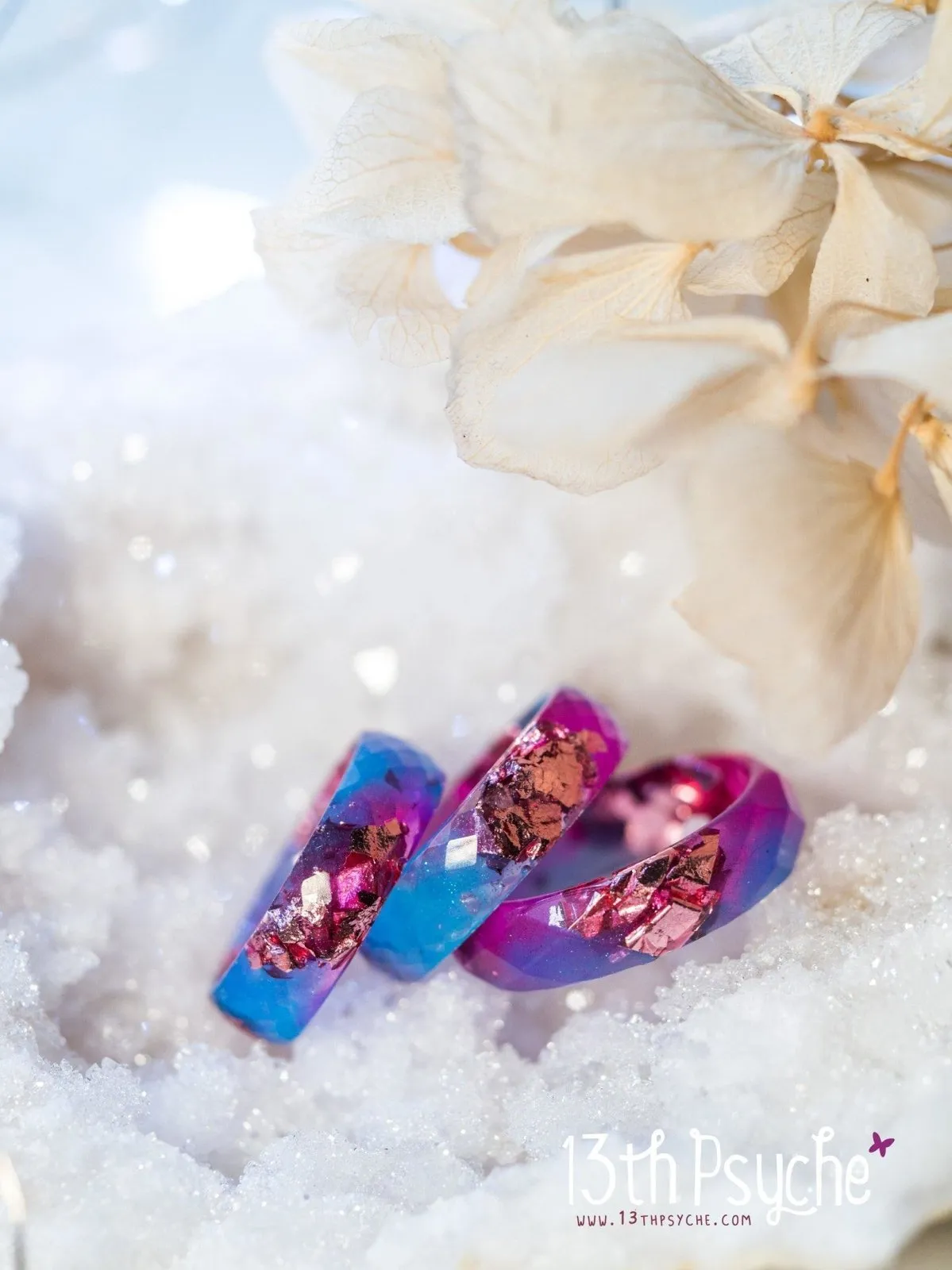 Blue and fuschia faceted resin ring with pink metallic flakes