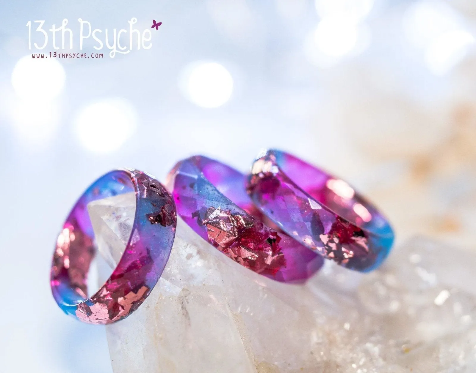 Blue and fuschia faceted resin ring with pink metallic flakes